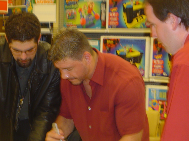 eddiesigning.jpg